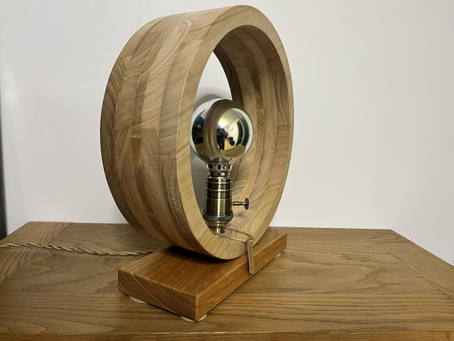 Modern round living room lamp with Edison bulb.