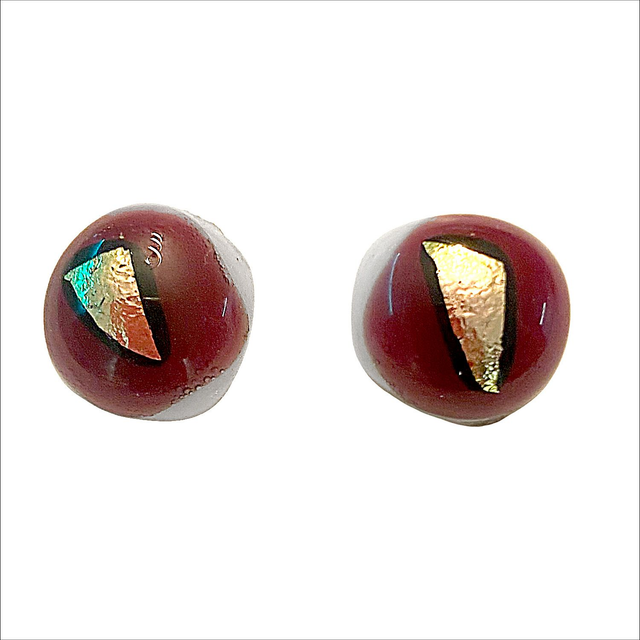 Stud earrings with maroon and gold dichroic glass on a white background (Ref ESS3)