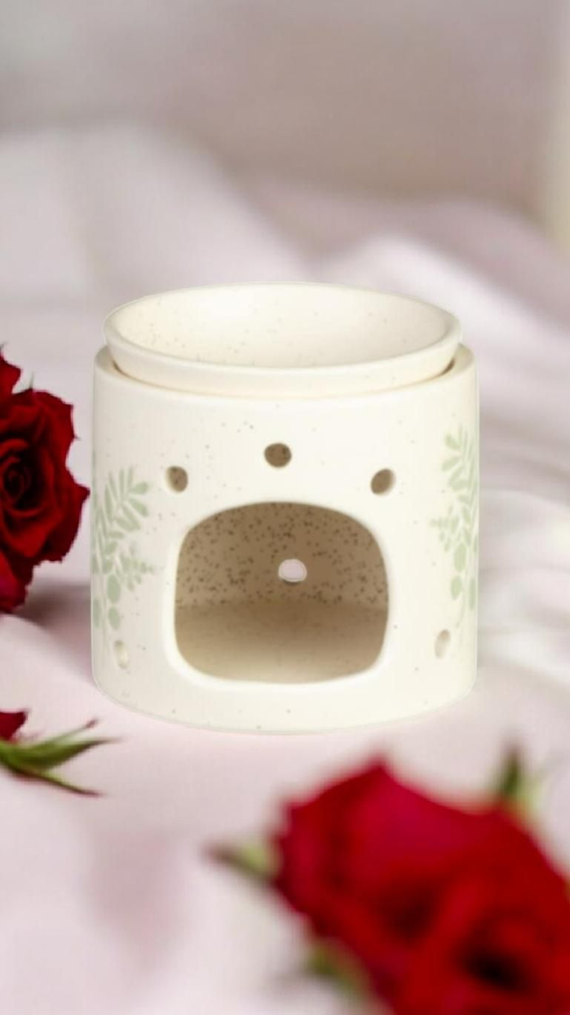 Brûleur avec dessin de feuille verte