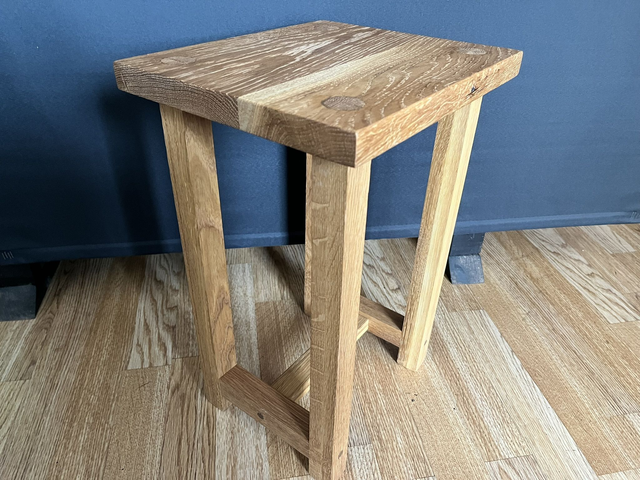 Kitchen stool made of solid oak wood.