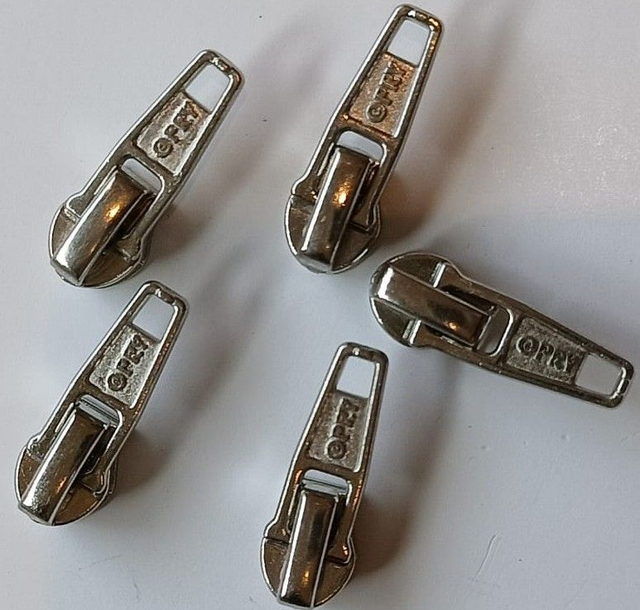 Huimerk: Ristschuiver  Nikkel