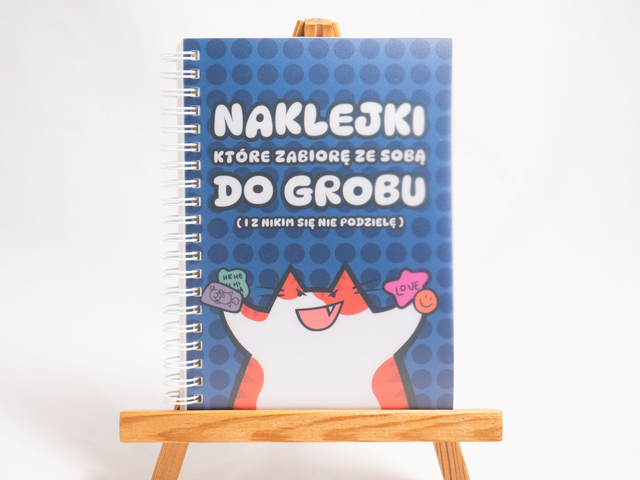 ZESZYT NA NAKLEJKI z rudo-białym kotem w naklejkach