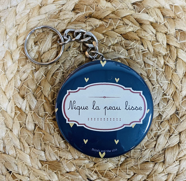 Porte clé Nique la peau lisse
