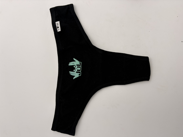 Tanga noir JuL signe bleu phospho 