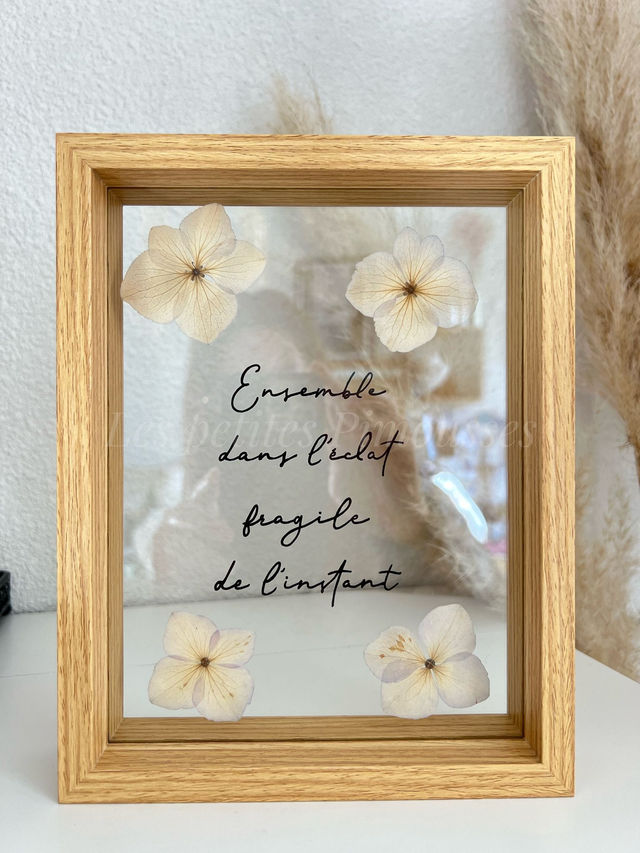 Cadre fleurs séchées et citation « Ensemble…