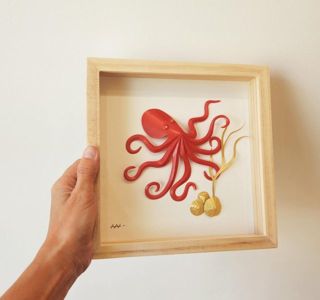 Poulpe rouge et récif doré