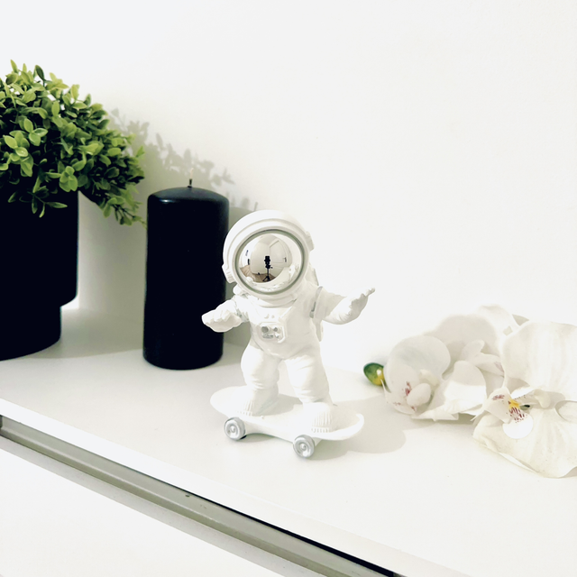 Futuristic Skateboarding Astronaut Statue - Unique Home Decor Piece