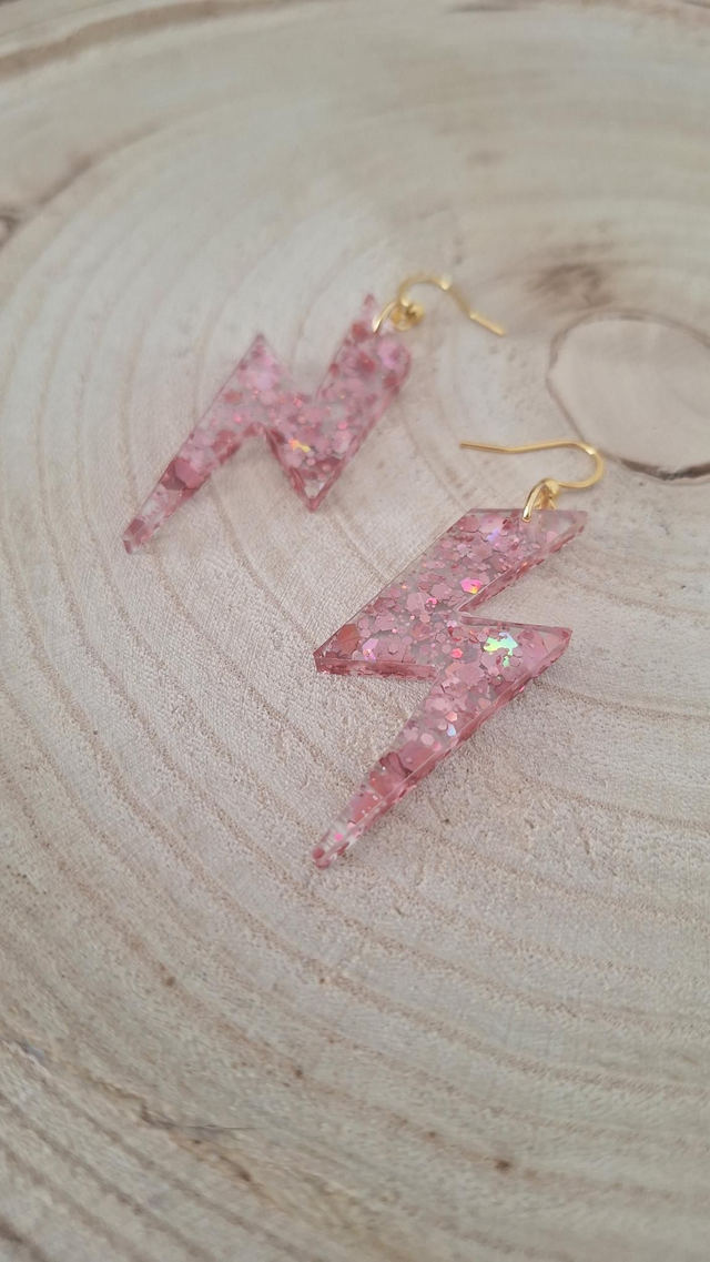 Boucles d&#039;oreilles éclairs paillettes roses 