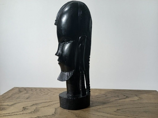 Vintage head of an African Maasai warrior, carved in ebony wood.