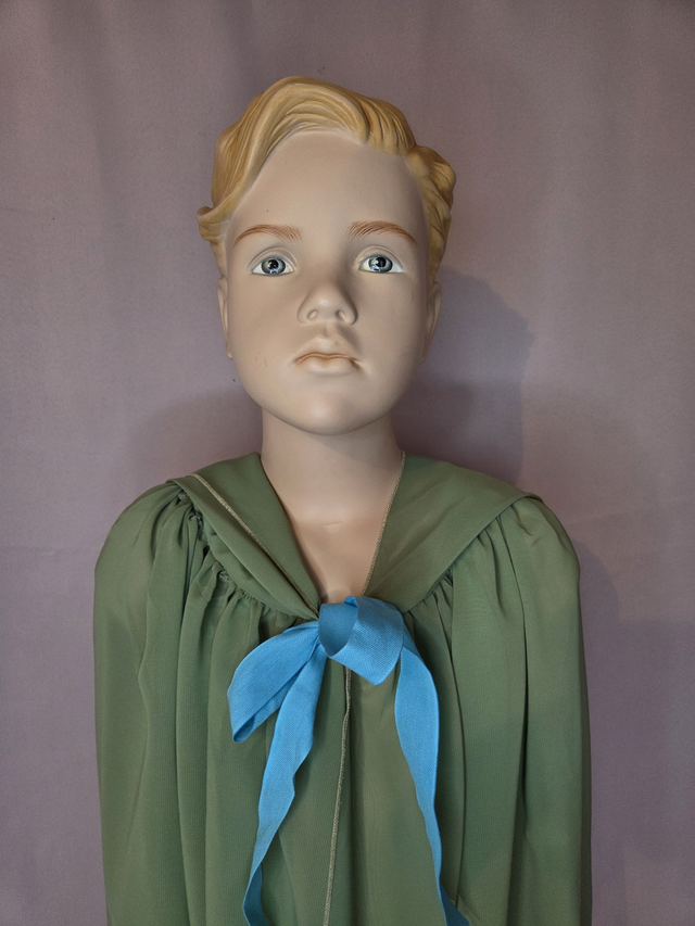 Cape de déguisement verte à ruban bleu