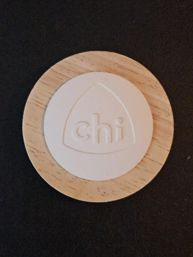 Aromasteen Chi met houten rand.