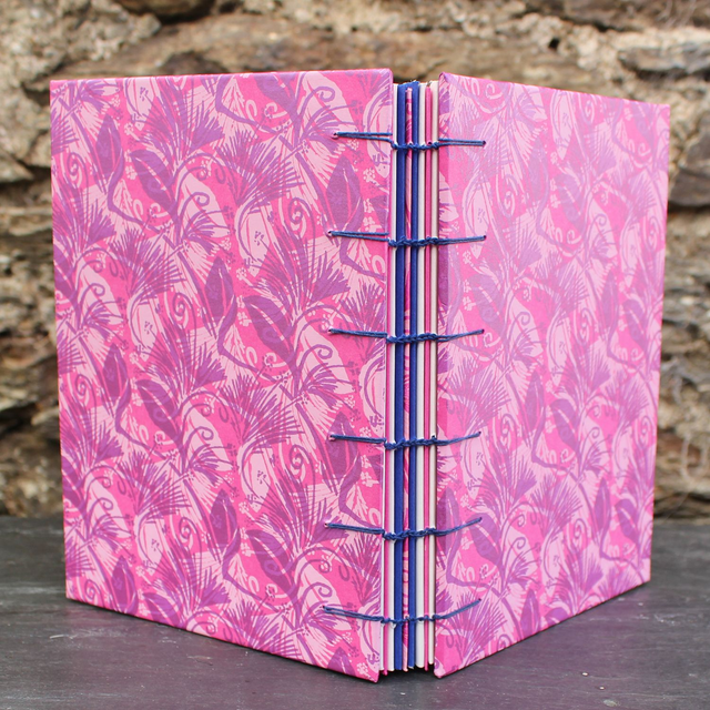 Memory book with hard covers and envelopes