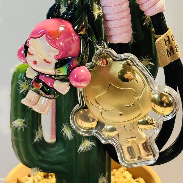 Skull Panda figure doll inspired keychain with matching gold SP charm, 2 designs