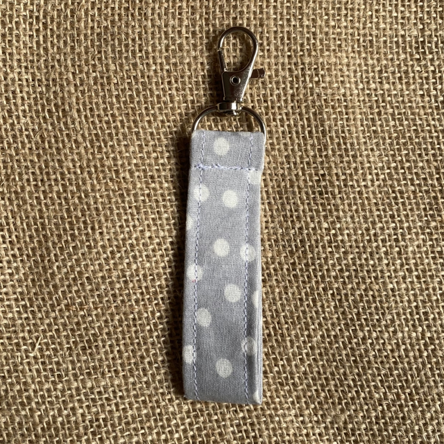 Porte clés imprimer bleu à pois 