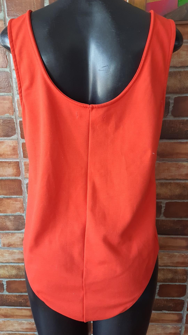 Body Laranjado T/Gg. OBS: Usado Super Conservado 