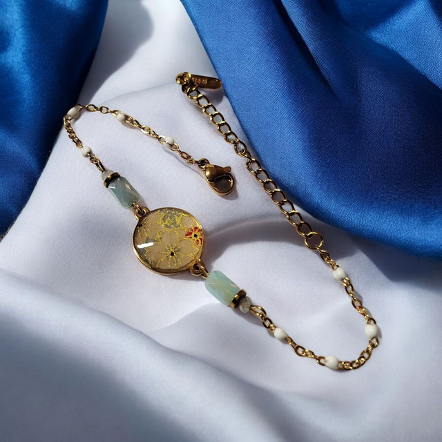 bracelet acier inoxydable motifs japonais blanc beige bleu clair et doré