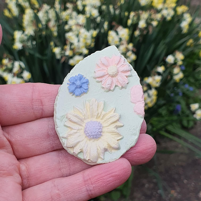 Multi flowers on leaf badge