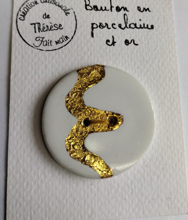 Bouton blanc et or fantaisie 