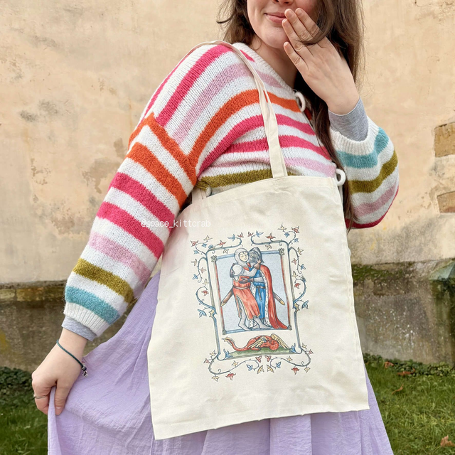 Embracing knights tote bag