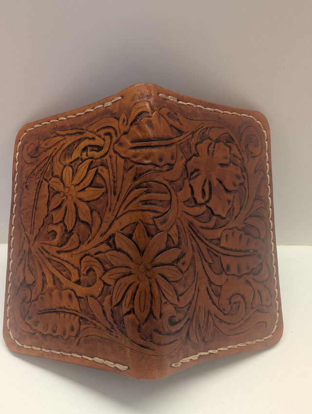 Porte carte 4 emplacements en cuir repoussé.