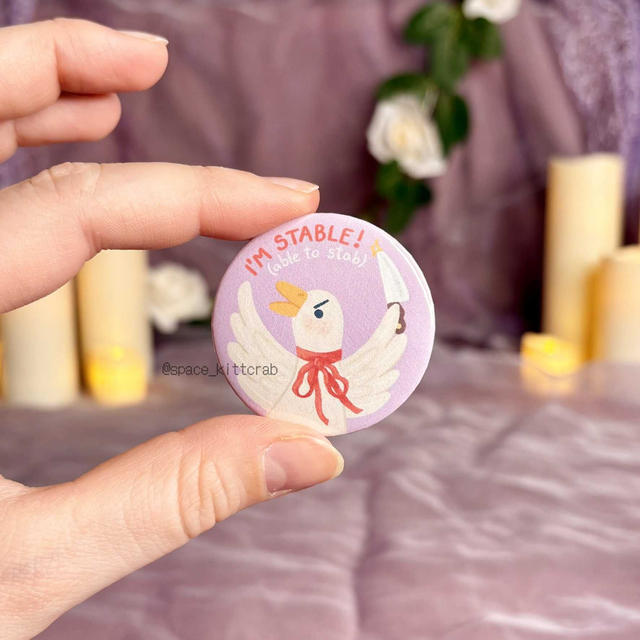 Stable (able to stab) button pin