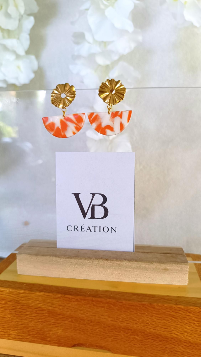 Demi-cercle marbré orange puces dorées