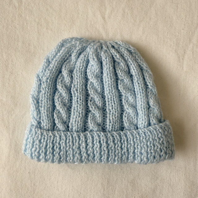 Blue cable knit hat