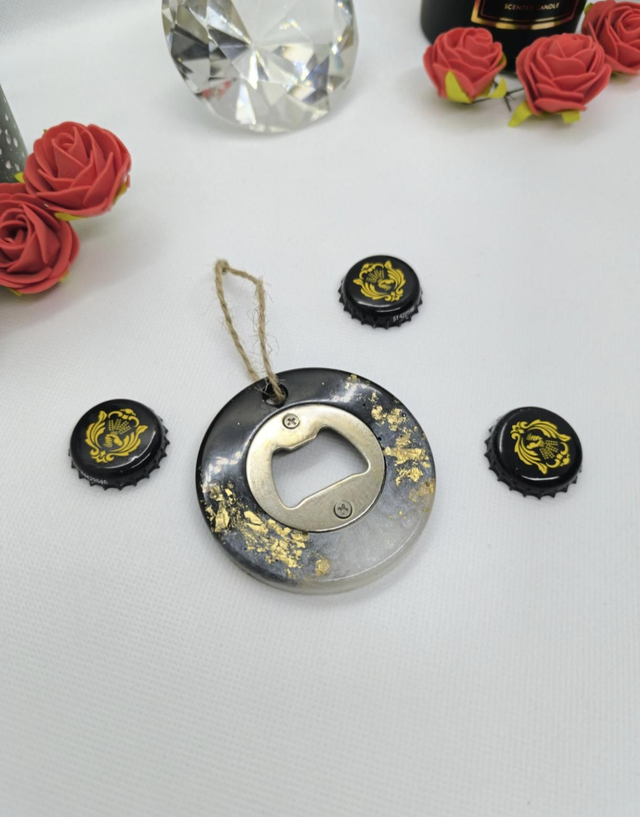 Décapsuleur rond noir et blanc nacré