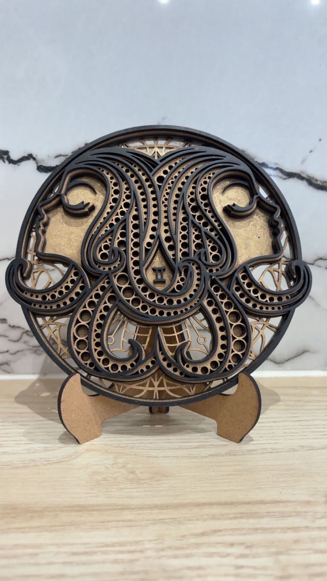 Gémeaux Noir sur Or 