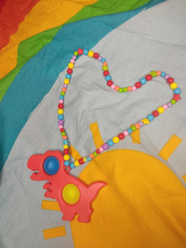 Collier dinosaure anti stress 