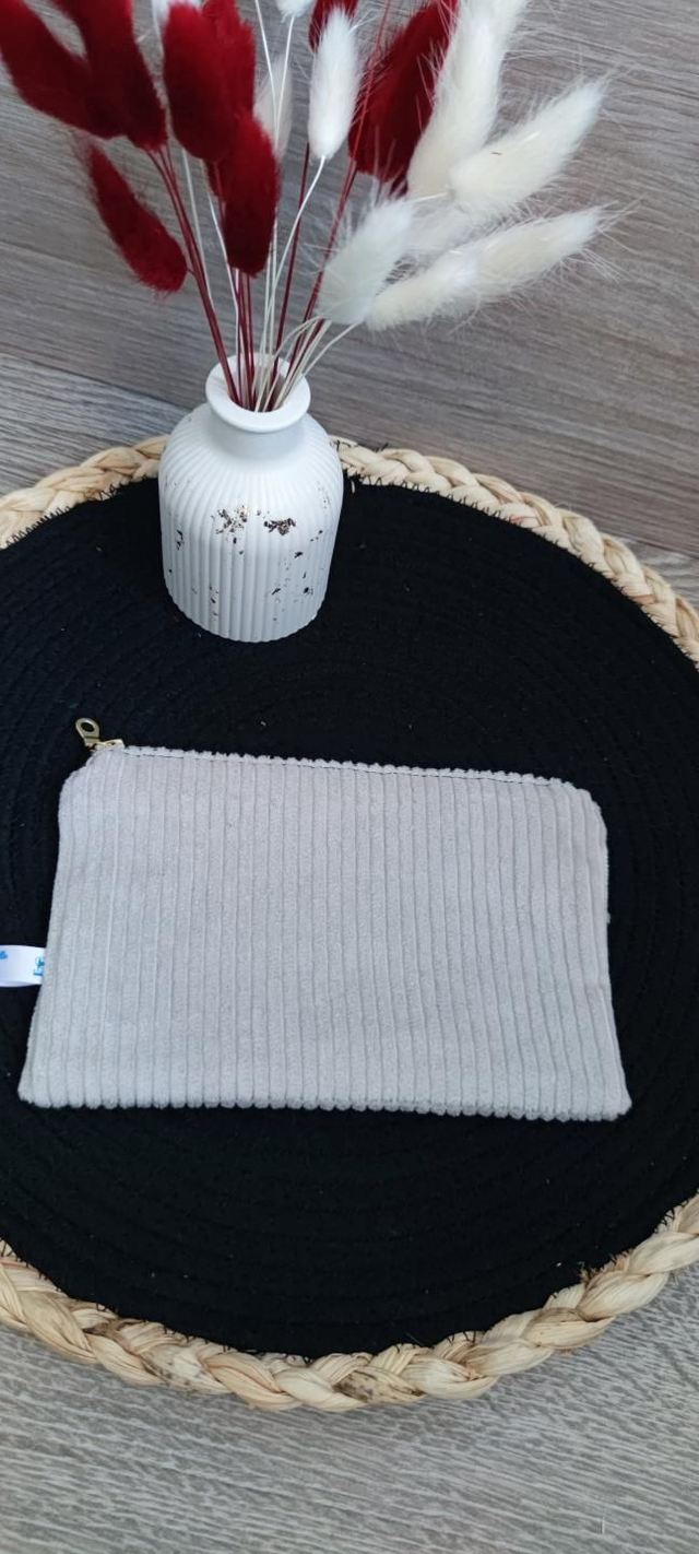 Trousse velours beige intérieur plumes 