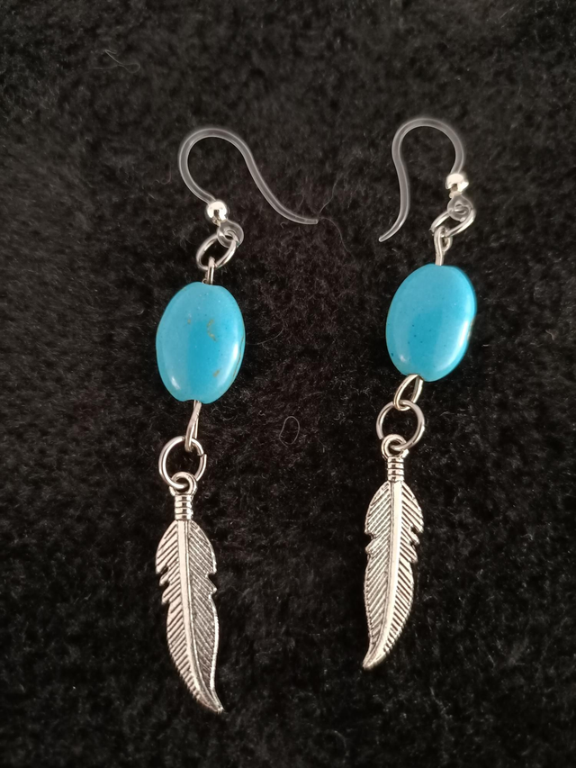 Boucles d'oreilles plumes et perles 