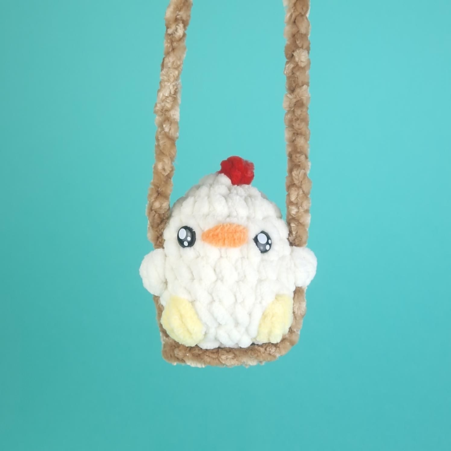 Poule sur balançoire