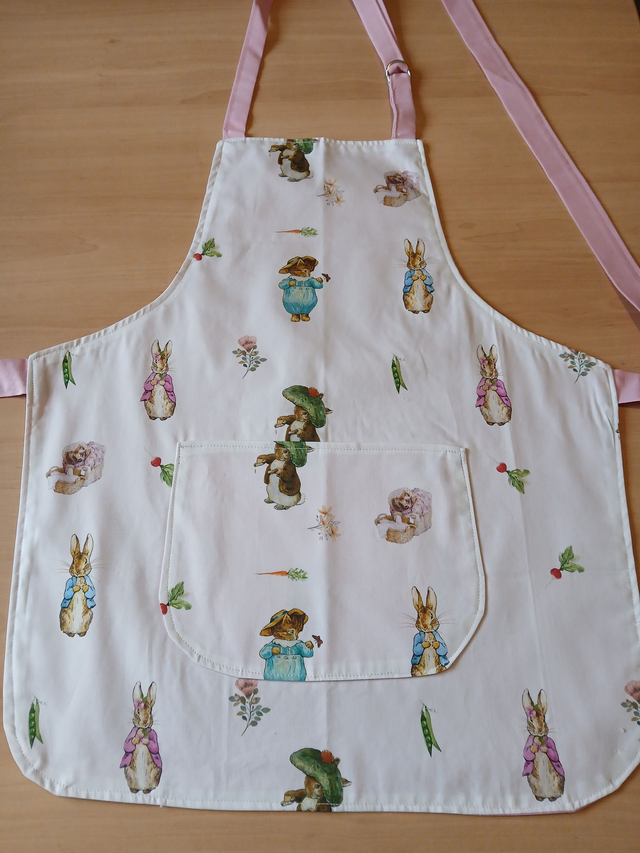 Child's Character Animal Print Apron: Fully lined with pocket.