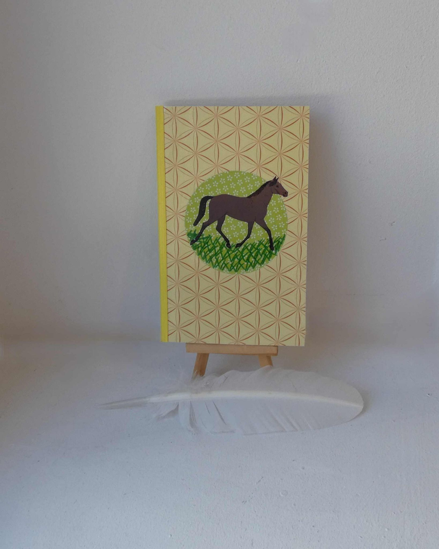 Le petit carnet quardillé aux chevaux