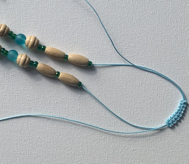 Hand made hand painted air dry clay beaded pendant