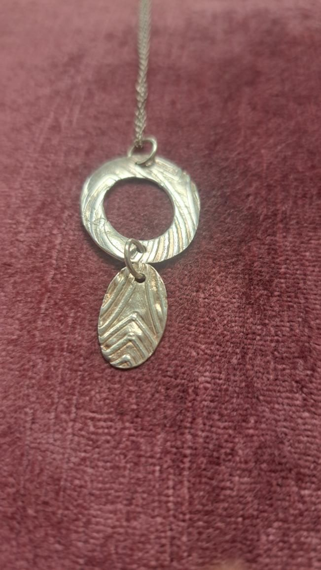 Oval double silver pendant