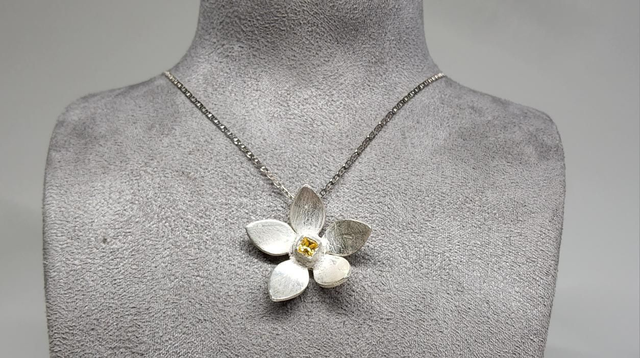 Flower with a square cubic zirconia fine silver pendant