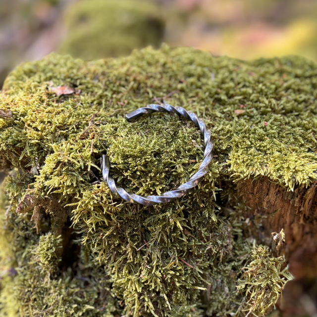 Manchette torsade homme