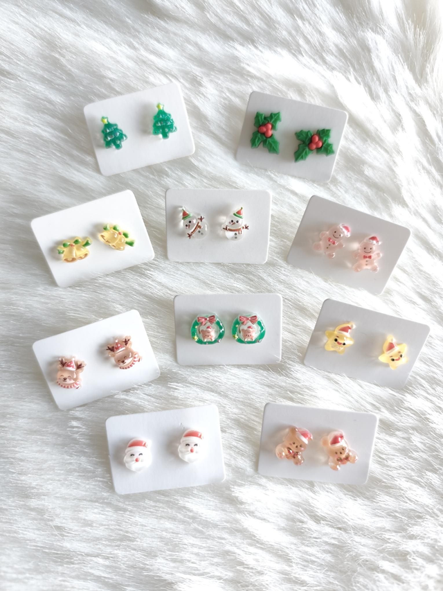 Boucles d&#039;oreilles puces de Noël 