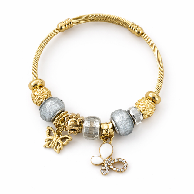 Pulsera acero dorado silver charm 
