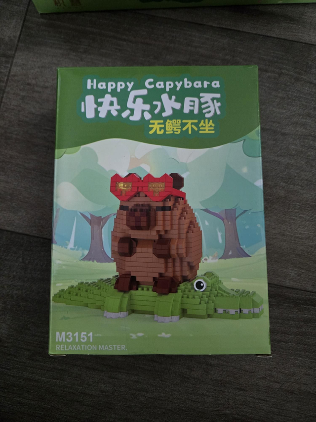 Capibara met krokodil