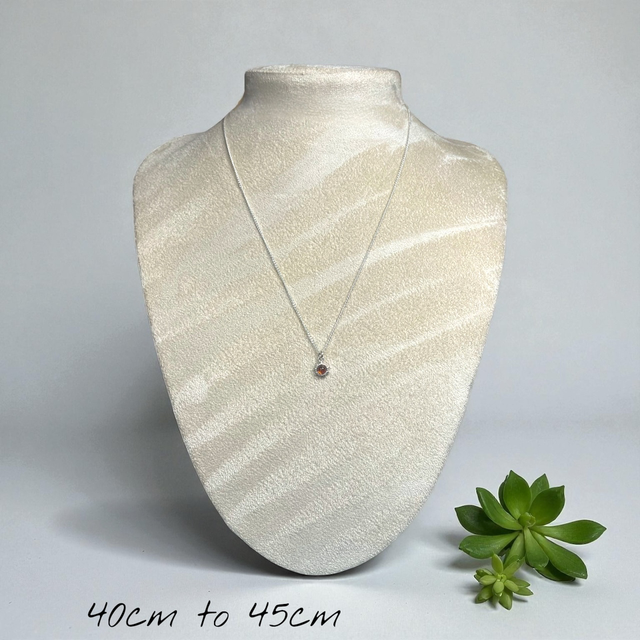 Amber and sterling silver pendant necklace