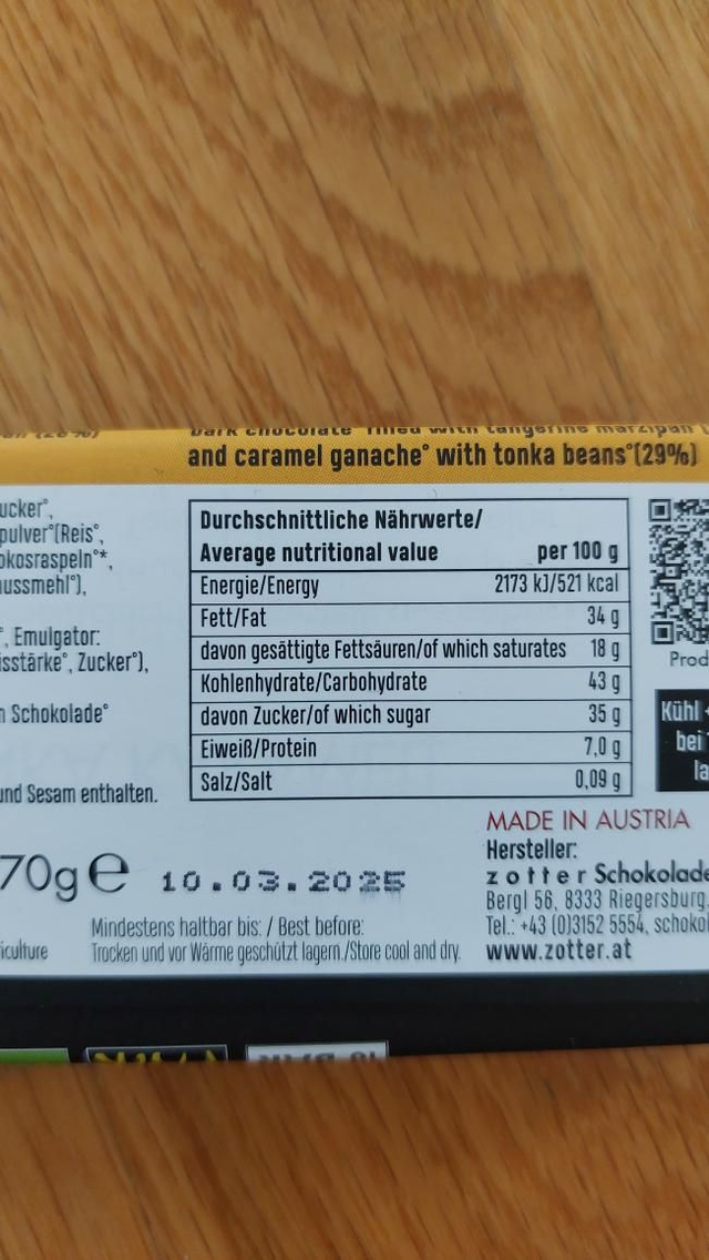 Zotter Tangerine marzipan & tonka bean caramel filled vegan handscooped bar