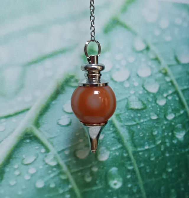 Pendule divinatoire sphère en cornaline