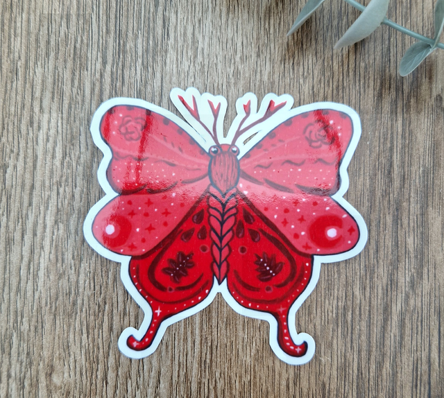 - Papillon éclipse ardente -