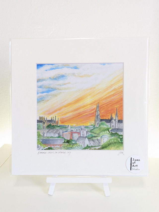 Armagh under an orange sky - Art Print by Joan McKeever