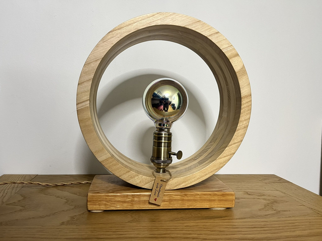 Modern round living room lamp with Edison bulb.