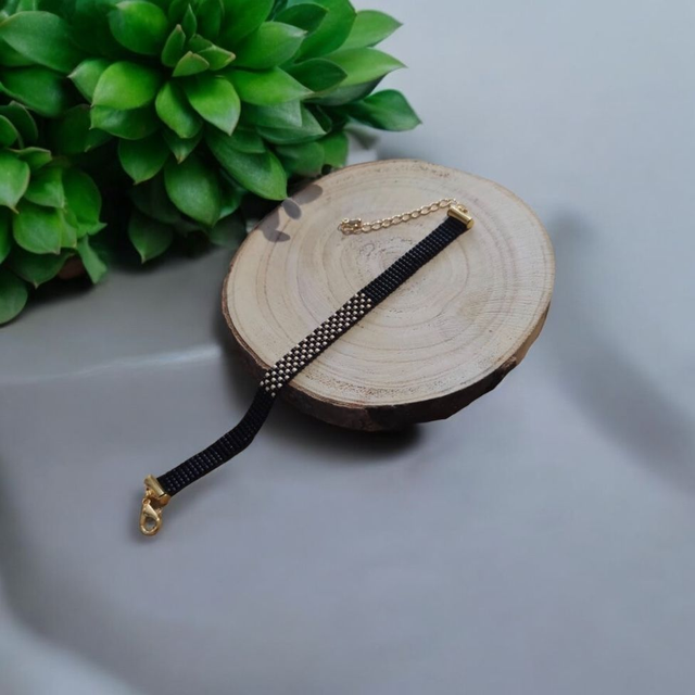 Bracelet noir et or