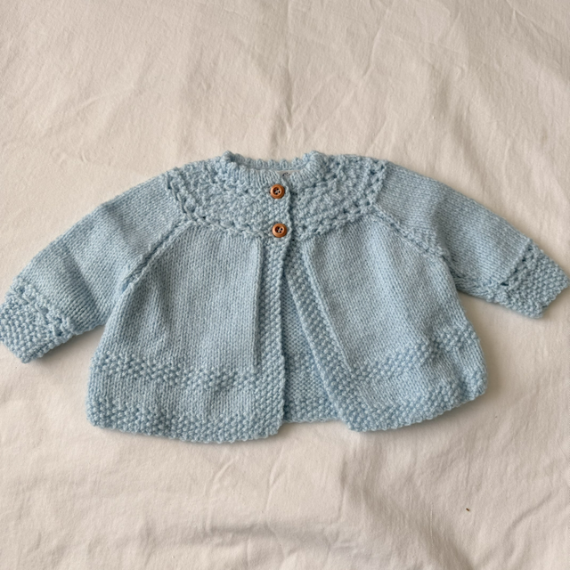 Blue knitted baby matinee jacket